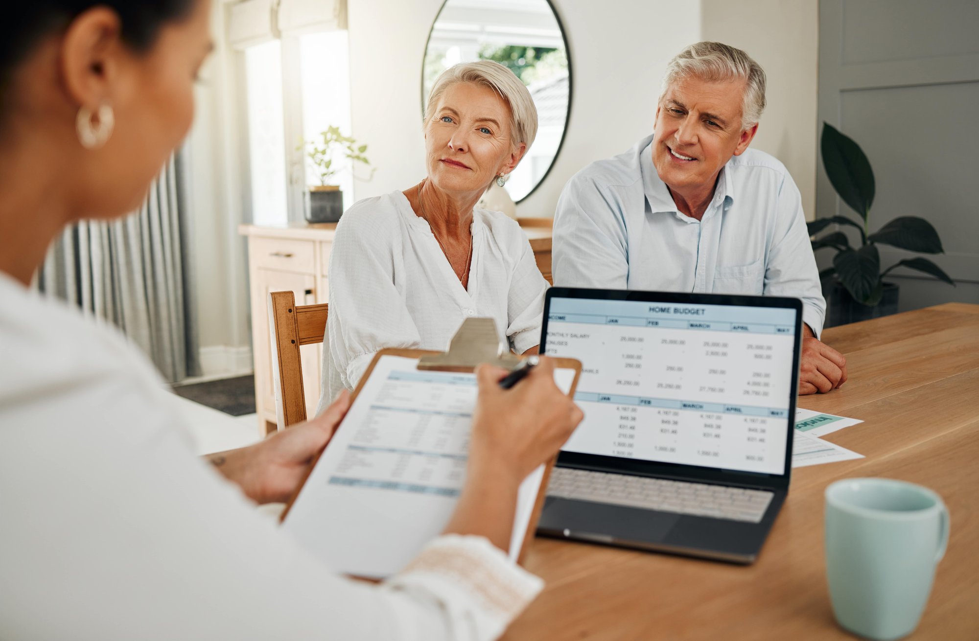 retirement-couple-and-accountant-with-finance-doc-2023-11-27-05-30-45-utc-min retirement-couple-and-accountant-with-finance-doc-2023-11-27-05-30-45-utc-min